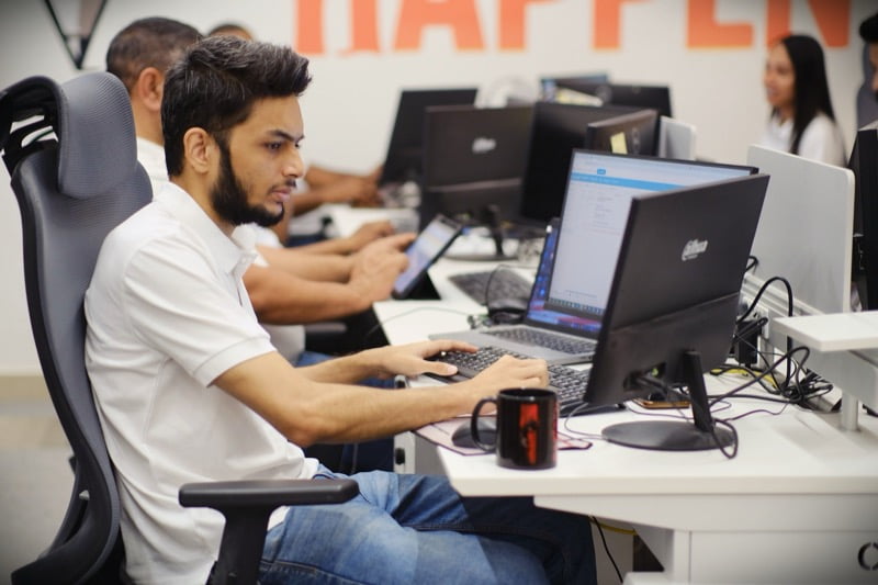 Swyft IT team member working on technical tasks